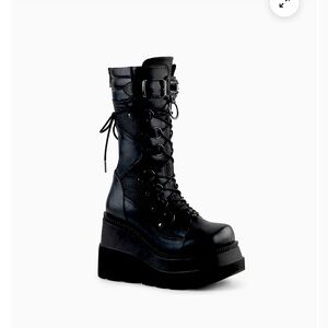 Selling size 8 women’s platform demonias . Lightly Worn and slightly scuffed
